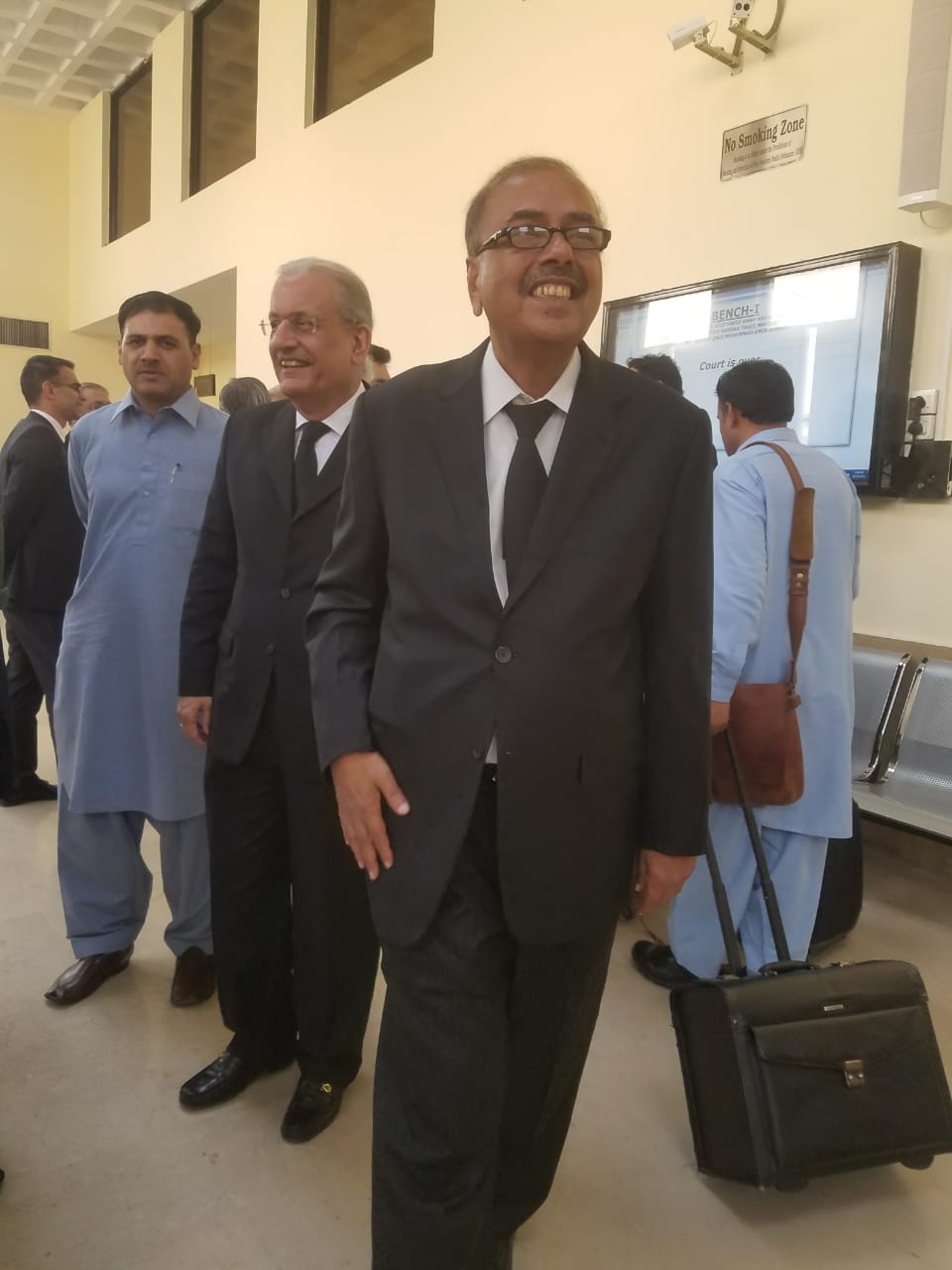 Munir A. Malik happy.