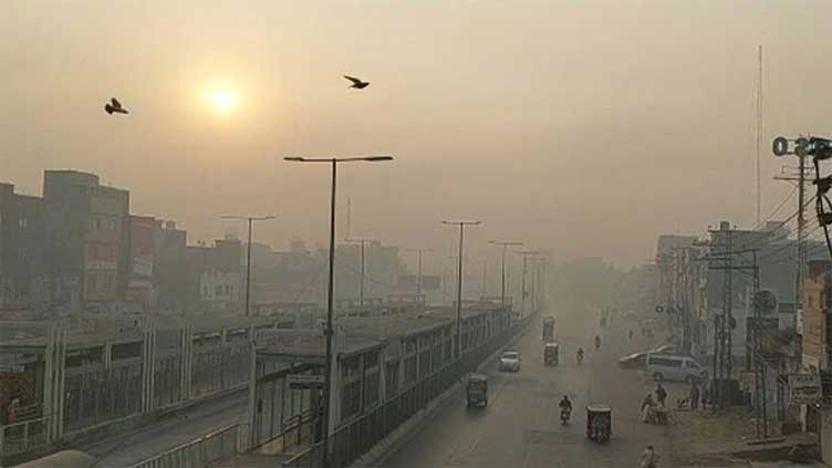 Lahore, most polluted city, air quality index, AQI Lahore, pollution in Lahore, stubble burning, smog, visibility issues, health advisories, Punjab government, Delhi pollution, NASA satellite image, environmental concerns, city of gardens, urban management, air pollution crisis, pollution statistics, respiratory health, indoor safety measures, face masks, school delays, October pollution, Editor, Khudayar Mohla, Ashi Asif