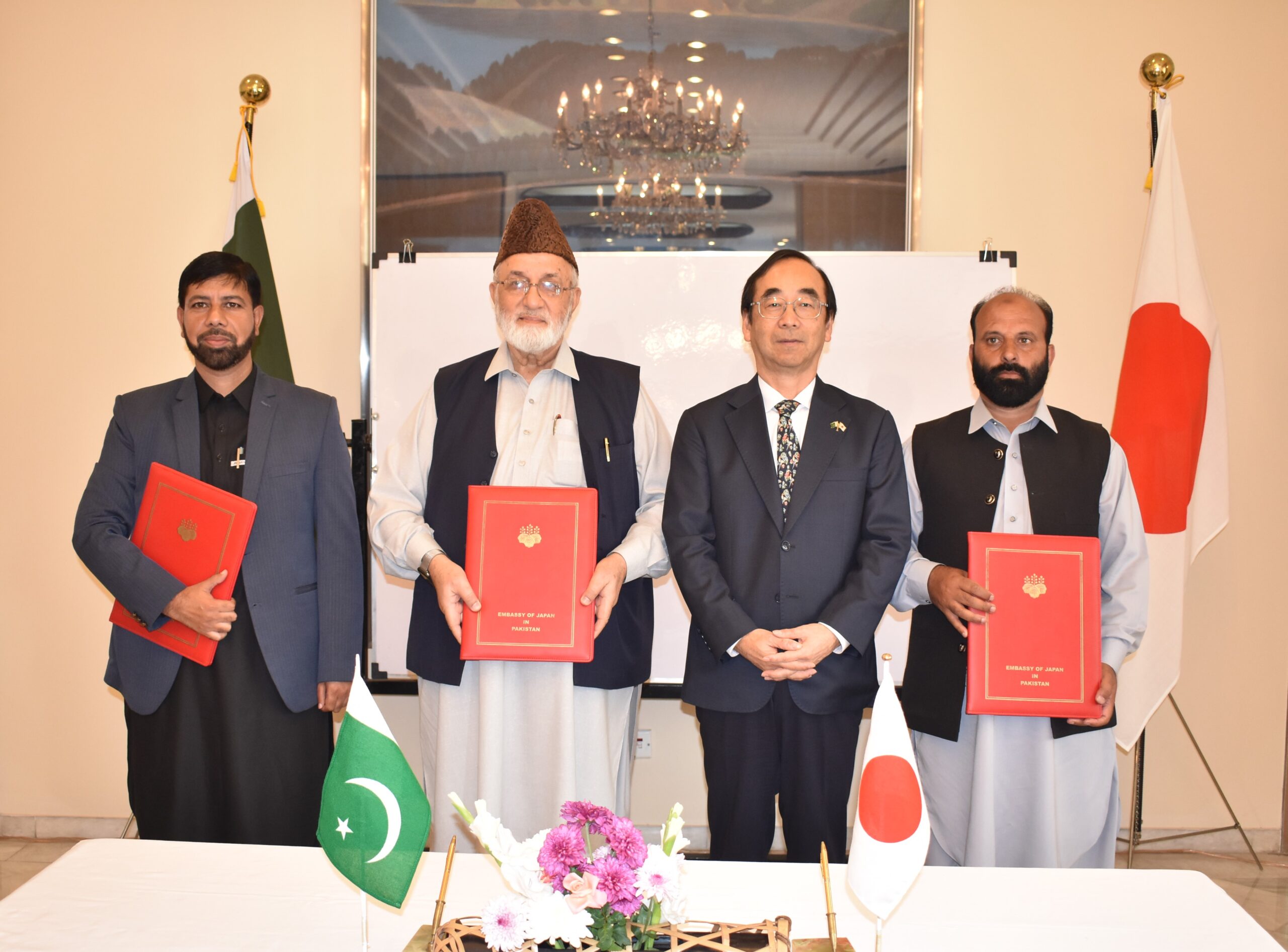 Representatives of Friends Welfare Association, Al Mezan Islamic Model Secondary School and  Al Khidmat Foundation Pakistan receive the grants