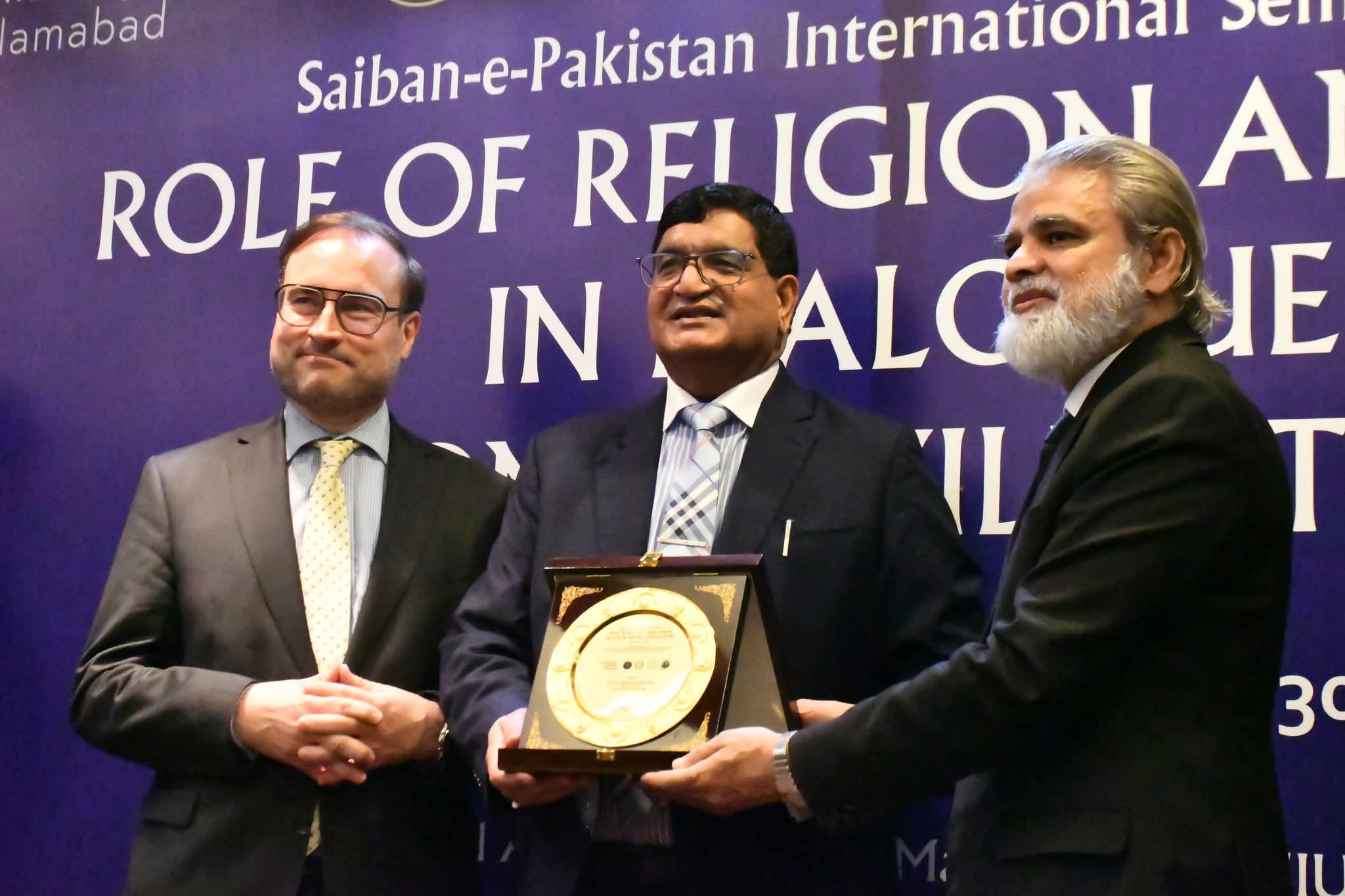 Saiban-e-Pakistan, IIUI, Islamic Research Institute, International Islamic University Islamabad, civilizational dialogue, interfaith harmony Pakistan, religion and law seminar, Austria Pakistan relations, embassy of Austria Pakistan, Islamic Research Council, IRCRA, Federal Shariat Court, Professor Dr. Muhammad Zia-ul-Haq, Senator Danish Kumar, Stefan Hammer, Kelly R. Johnson, Wolfgang Oliver Kutschera, interfaith cooperation, academic diplomacy, international seminar Islamabad, dialogue among civilizations, Shariah and Law Faculty IIUI, religious diplomacy Pakistan, international scholars Islamabad, Apostolic Nuncio Pakistan, Archbishop Germano Penemote, civilizational harmony